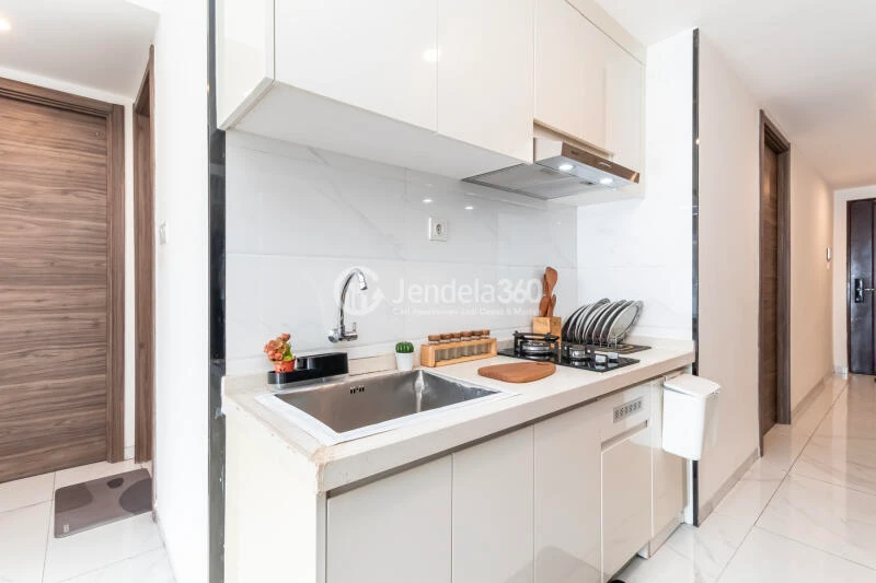 Kitchen Lovely 3BR Apartment Low Floor with  View at Sky House BSD Apartment
