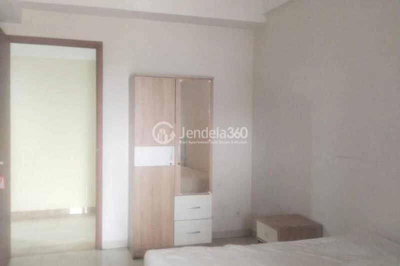 Bedroom Low Floor Studio Apartment with Water Park View at Green Lake View Depok Apartment
