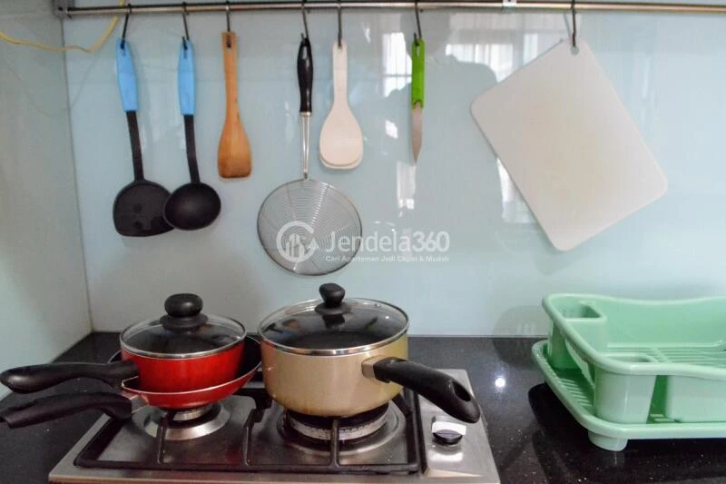 Kitchen Restful 1BR Apartment at Salemba Residence Tower B