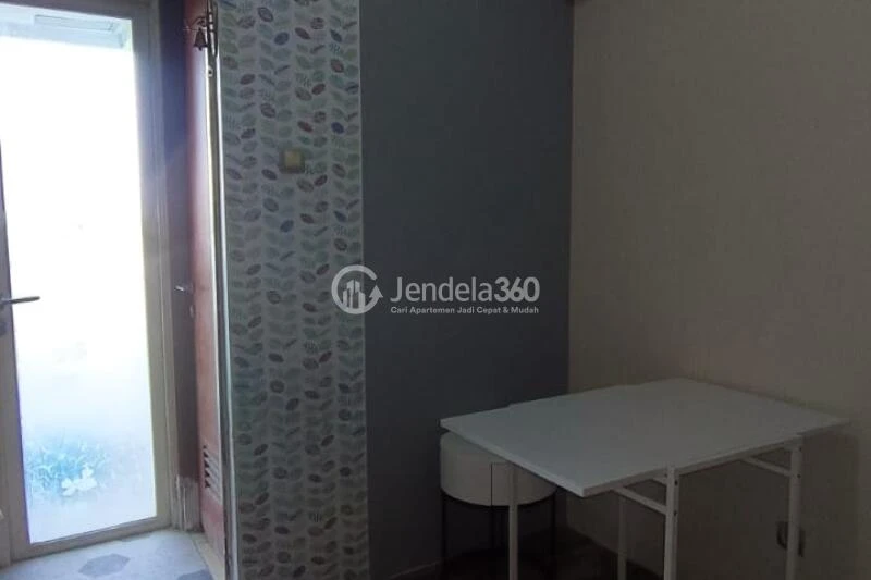 Living Room 1BR Green Lake View Apartment at Tower E