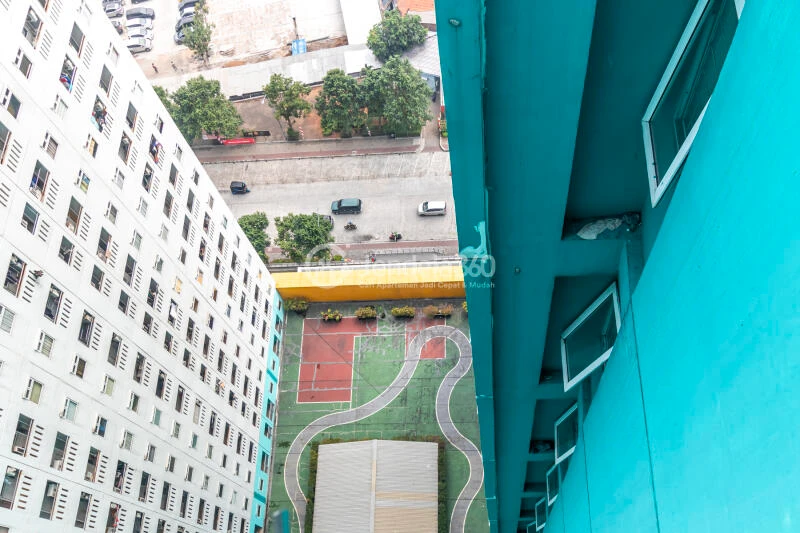 Balcony High Floor 2BR Apartment with City View at Green Pramuka City Apartment