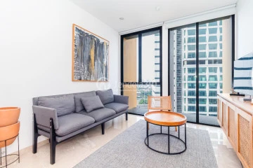 Living Room Flawless 2BR Apartment Middle Floor with Toll Road View at Izzara Apartment