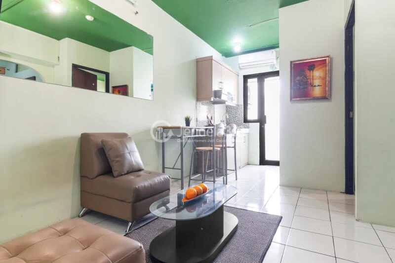 Living Room Tidy 2BR Apartment High Floor with City View at Kebagusan City Apartment