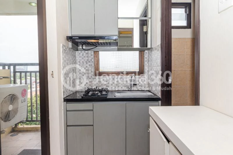 Kitchen Restful 1BR Apartment at Kebagusan City Apartment Low Floor