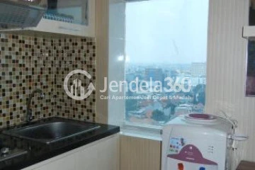 Kitchen Middle Floor Studio Apartment with City View at Menteng Square Apartment