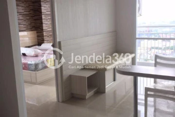 Living Room Cozy 1BR Apartment High Floor with City View at Taman Melati Margonda Apartment