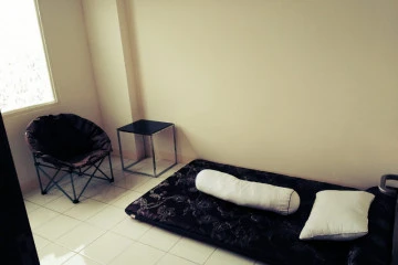 Bedroom Low Floor 2BR Apartment with City View at Podomoro Golf View Apartment