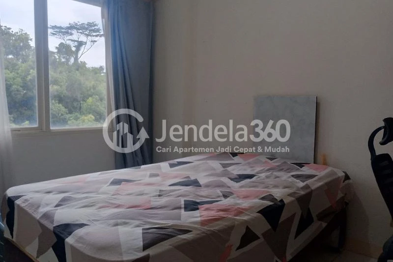 Bedroom 1 2BR Apartment with Jalan tol View at Podomoro Golf View Apartment