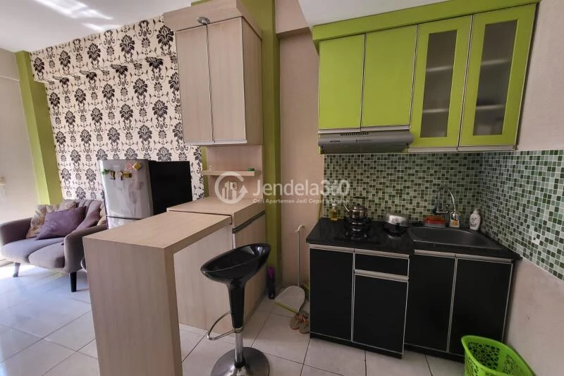 Kitchen 2BR Apartment with Swimming Pool View at Grand Centerpoint Apartment