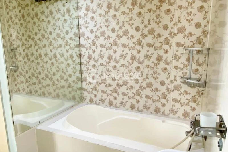 Bathroom Affordable 3BR Apartment Middle Floor with Pool View at Gading Mediterania Residence