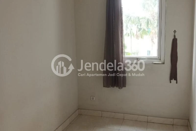 Bedroom 2 Low Floor 2BR Apartment with City View at Grand Palace Kemayoran