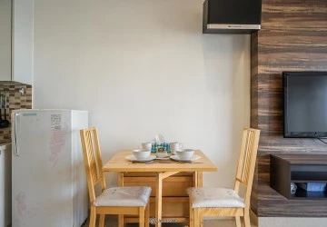 Dining Room 1BR Royale SpringHill Residence Apartment at Tower Bulgari