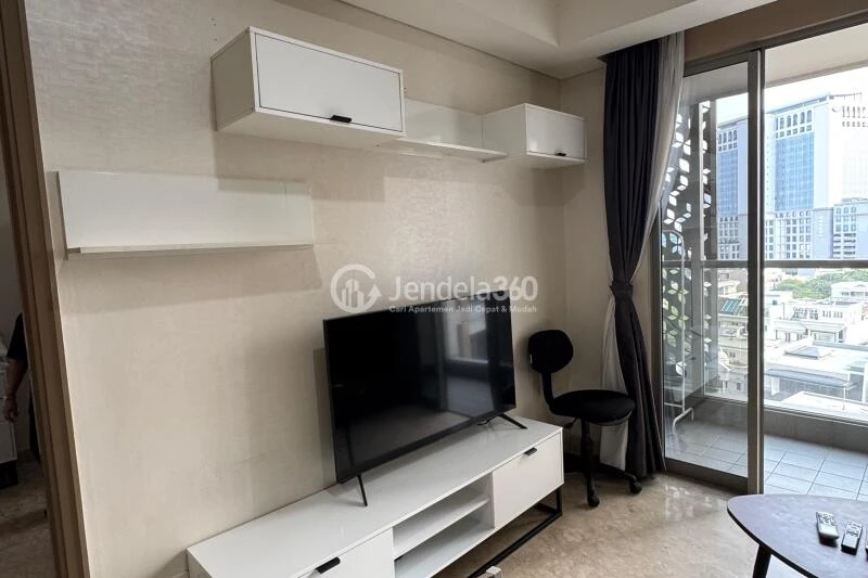 Living Room Low Floor 1BR Apartment with City View at Gold Coast Apartment