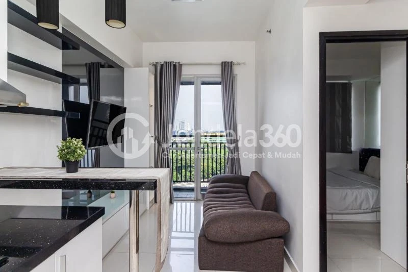 Living Room Homey 1BR Apartment at Westmark Apartment Middle Floor