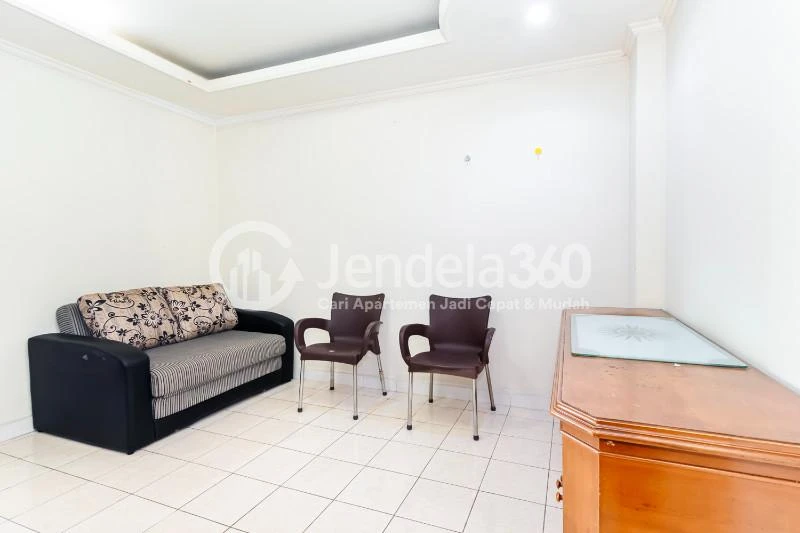 Living Room Spotless 1BR Apartment at Permata Eksekutif Apartment Tower 2