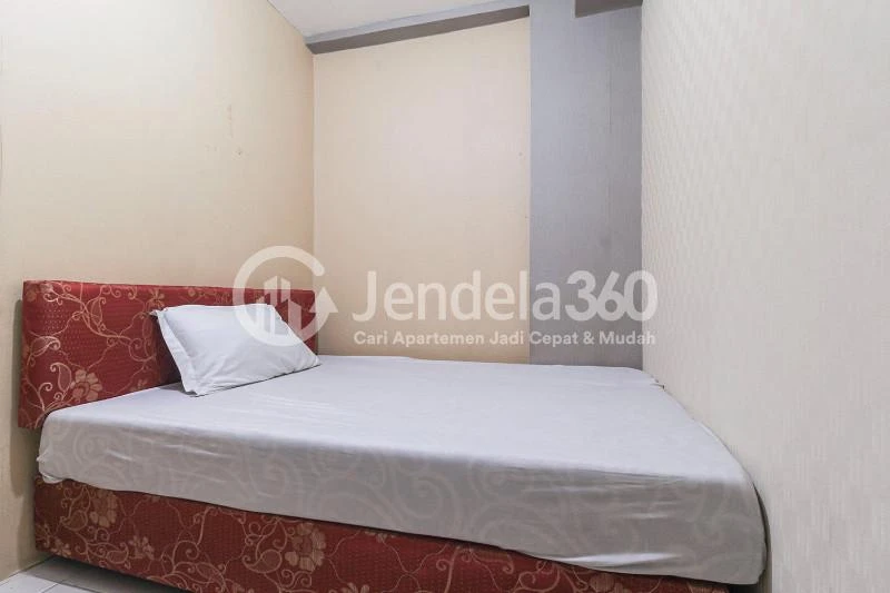 Bedroom 2 Cozy 2BR Apartment at Tifolia Apartment