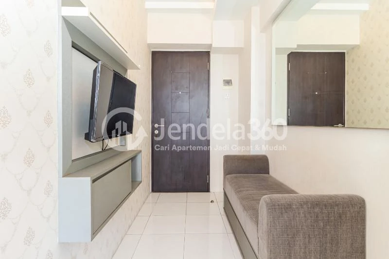Living Room Restful 1BR Apartment at Kebagusan City Apartment Low Floor