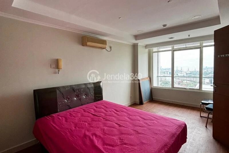 Bedroom 2 Restful 5BR Apartment High Floor with Whoosh Station View at Patria Park Apartment