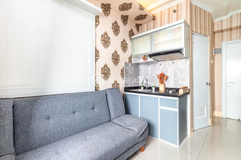 Living Room High Floor 2BR Apartment with City View at Green Pramuka City Apartment