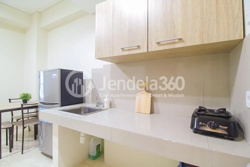 Kitchen Modest 1BR Apartment with Spa & Fitness Center at Puri Orchard Apartment