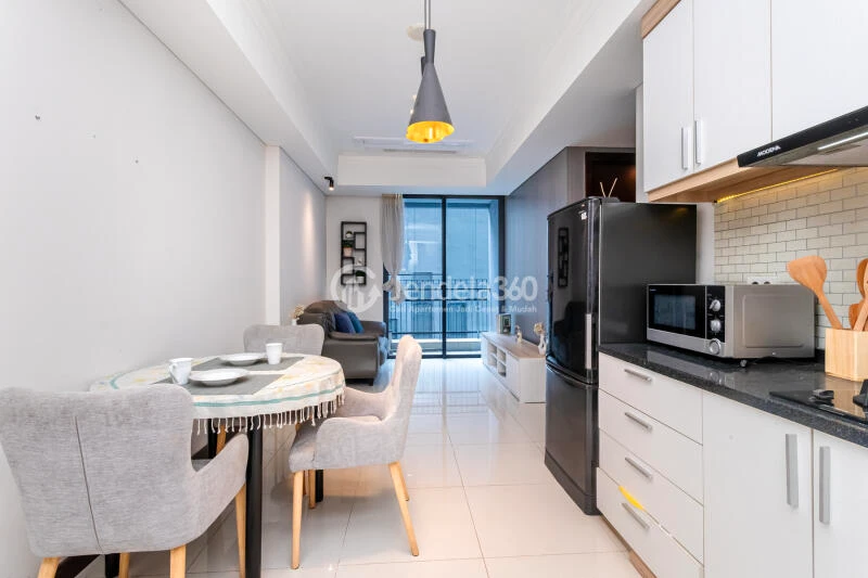 Dining Room 2BR Casa Grande Apartment at Low Floor Swimming Pool View