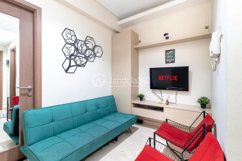 Living Room Low Floor 1BR Apartment with city View at Puri Orchard Apartment