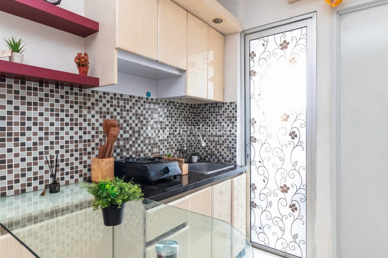 Kitchen High Floor 2BR Apartment with CITY View at Bassura City Apartment
