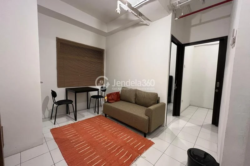 Living Room Middle Floor 2BR Apartment with Hotel View at Grand Asia Afrika Residence