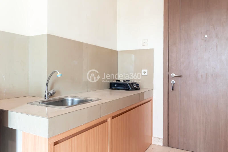 Kitchen Low Floor Studio Apartment with city View at Puri Orchard Apartment