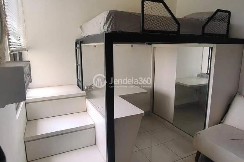Bedroom Compact Studio Apartment Low Floor with Garden View at EcoHome Citra Raya