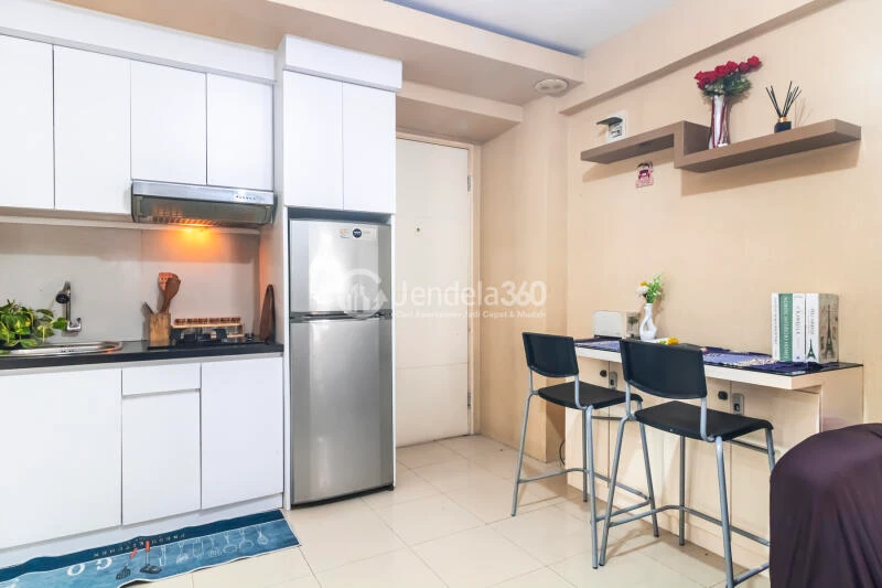 Kitchen Peaceful 3BR Apartment at Bassura City Apartment Tower Geranium