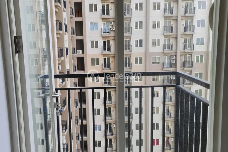 Balcony Well Located 2BR Apartment Middle Floor with City View at Podomoro Golf View Apartment