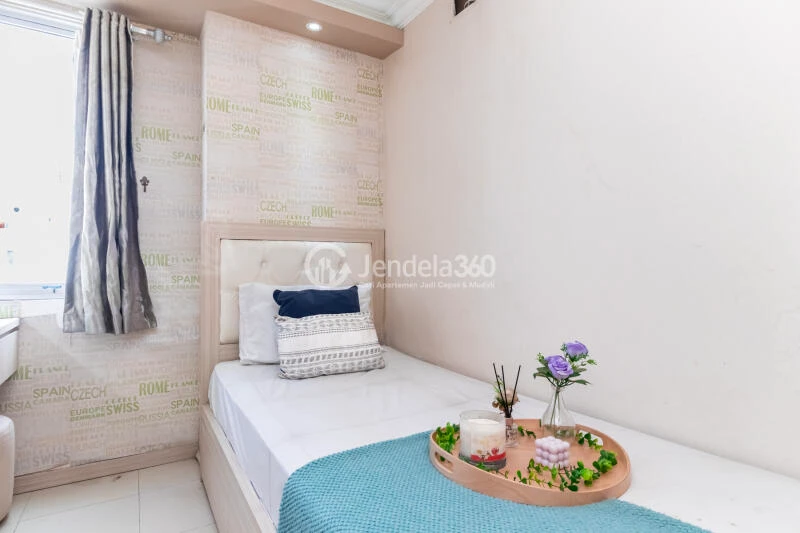 Bedroom 2 High Floor 3BR Apartment with city View at Bassura City Apartment
