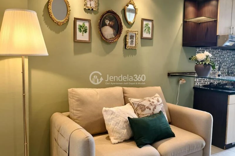 Living Room High Floor 2BR Apartment with City View at Kalibata City Apartment