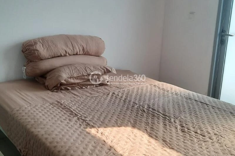 Bedroom Studio Pesona Depok Square Apartment at Middle Floor