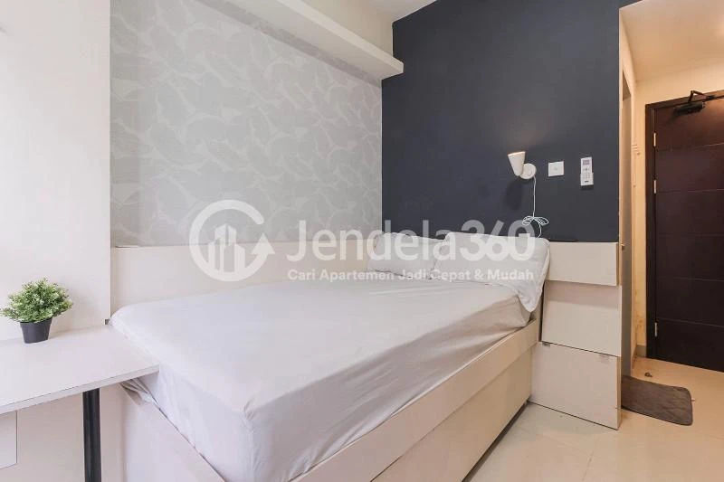 Bedroom Cozy Studio Apartment with Direct Access to Universitas Indonesia Train Station at Taman Melati Margonda Apartment