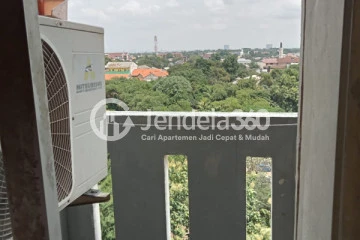 Balcony Peaceful 2BR Apartment Low Floor with City View at Cibubur Village Apartment
