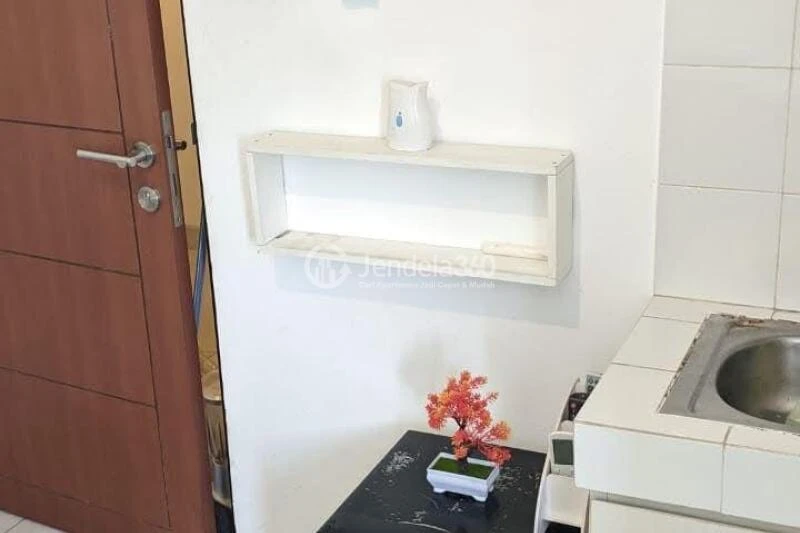 Kitchen Compact Studio Apartment Low Floor with Garden View at EcoHome Citra Raya