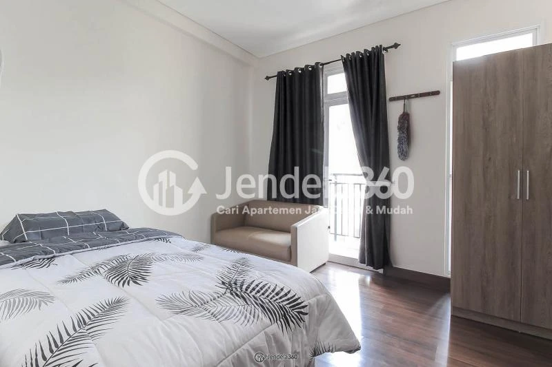 Bedroom Restful Stduio Apartment with City View from The Top Floor at Puri Orchard Apartment