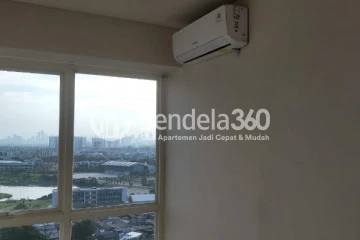 Bedroom Middle Floor 1BR Apartment with Pool View at Callia Apartment