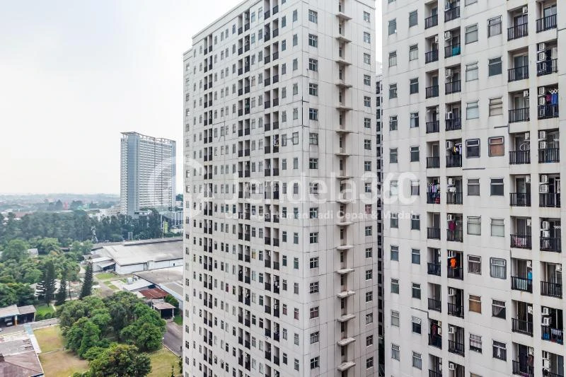 Balcony Cozy 2BR Apartment Middle Floor with City View at Kota Ayodhya Apartment