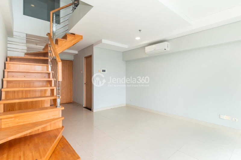 Living Room Restful 2BR Apartment Middle Floor with City View at Maqna Residence