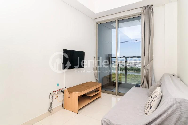 Living Room Middle Floor 2BR Apartment with City View at Gold Coast Apartment