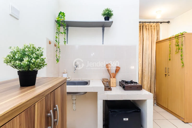 Kitchen Middle Floor Studio Apartment with river and city view View at Puri Park View Apartment