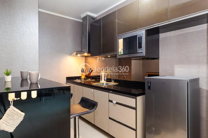 Kitchen Modest & Relaxing 2BR Apartment with Strategic Location at Sahid Sudirman Residence