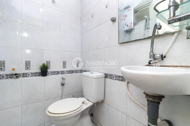 Bathroom Cozy 2BR Apartment at Gading Nias Apartment Tower Dahlia