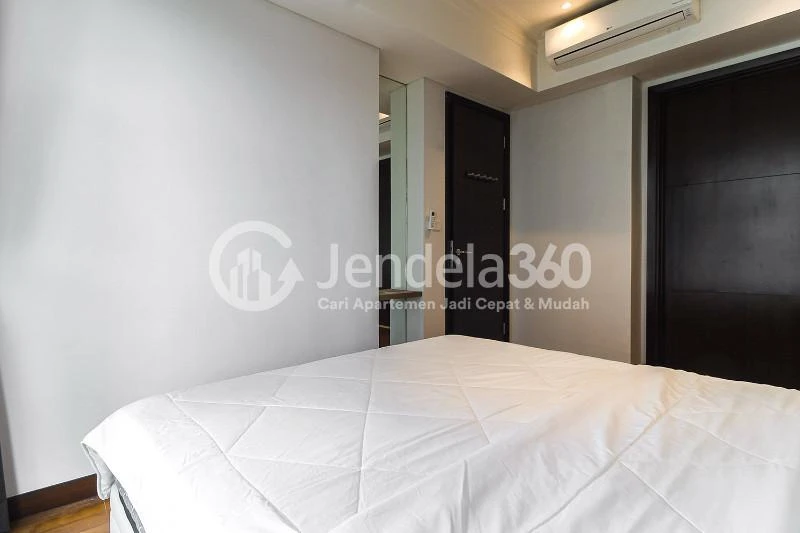 Bedroom 1 Restful 2BR Low Floor Apartment at Casa Grande Apartment