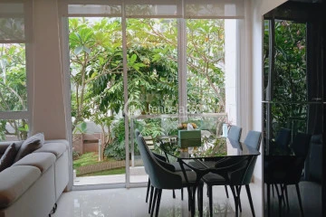 Living Room Compact 2BR Apartment Low Floor with City View at Rainbow Springs Condovillas