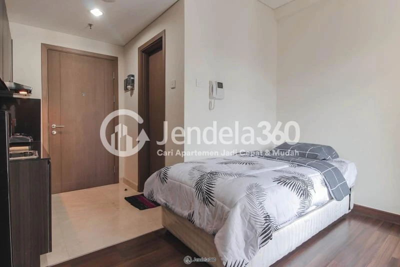 Bedroom Restful Stduio Apartment with City View from The Top Floor at Puri Orchard Apartment