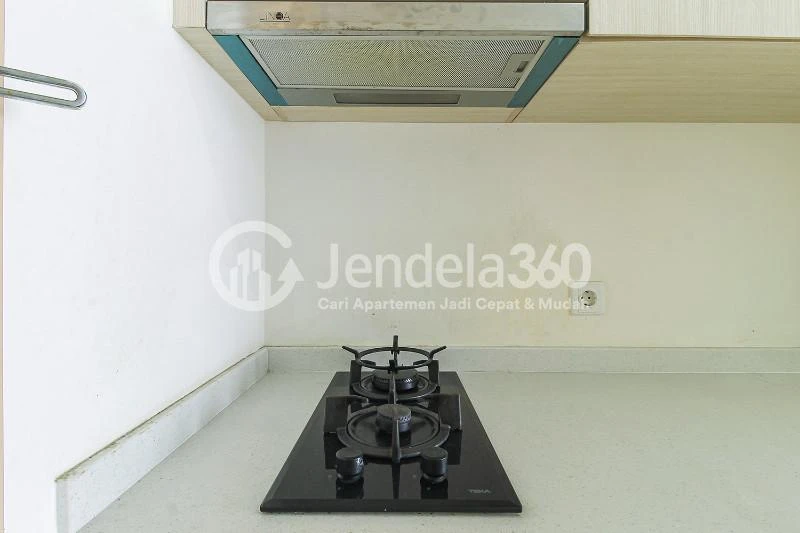 Kitchen Furnished Studio Apartment with City View at Sedayu City Apartment